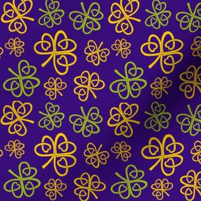 Celtic love shamrocks green and gold on purple 