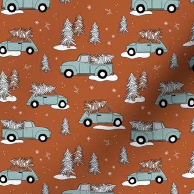 Christmas pick up - driving home for Christmas seasonal holidays snow pine trees and cars kids theme rust burnt orange moody blue boys palette