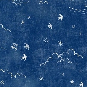 Feathers and Birds in White on Indigo (large scale) | Hand drawn bird fabric, feather pattern, clouds, stars, moon and sun in fresh white on indigo blue linen pattern.