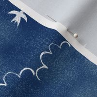 Feathers and Birds in White on Indigo (xl scale) | Hand drawn bird fabric, feather pattern, clouds, stars, moon and sun in fresh white on indigo blue linen pattern.