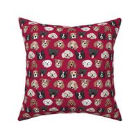 Dogs and puppies - freehand illustration boho style border collie beagle poodle staffies and shih tzu faces on ruby red
