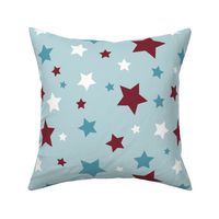 Red, white and blue stars on a pale blue background