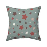 Dusty pink, white and grey retro stars on a blue background