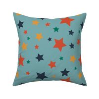 Orange, yellow, green and blue retro stars on pale blue background