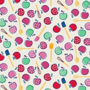 Tossed Ditzy Red and Pink Polka Dot Apples with Kitchen Spatulas and Whisks on Cream Ground Non Directional