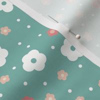 White and pink daisy flowers with polka dots on an egg blue background