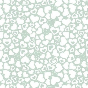 Valentine rainbow hearts -  retro boho heart shaped love design in white on soft pastel green spring design