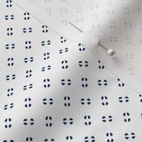 Simple speckles in navy on white