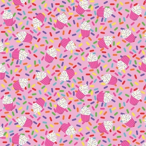 RAINBOW SPRINKLES CUPCAKES on pink background  PANTONE 521 