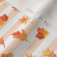 Fall leaves on the striped background