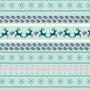 Reindeer Christmas Sweater in Dark Blue, Mint Green, and Pink