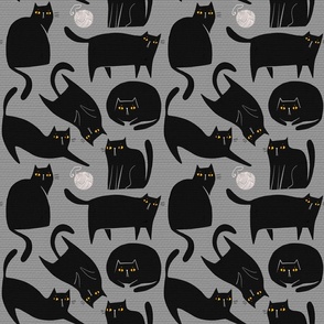 Black cats on gray background