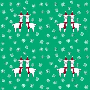 Christmas llamas on green