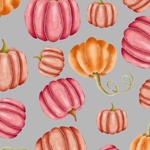 Pumpkins on grey