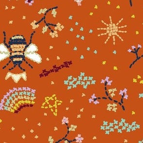 Funny modern cross stitching with bees and rainbows on cinnamon brown Large scale 