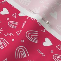 Calico pattern with hearts rainbows and stars white on pink