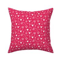 Calico pattern with hearts rainbows and stars white on pink