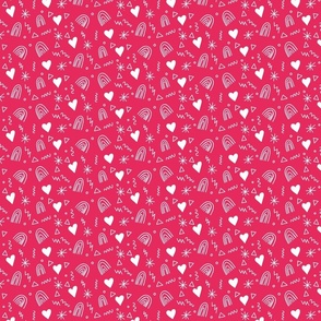 Calico pattern with hearts rainbows and stars white on pink