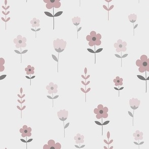 Leaves and pink flowers on light background