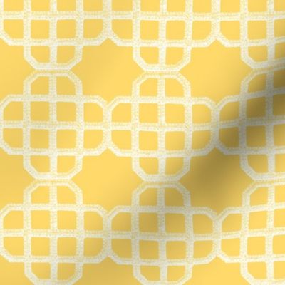 embroidered looking knot  in buttercup yellow and white