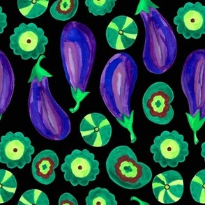 Purple eggplant with green leaves on a black background.