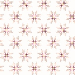 cross stitch flower on white