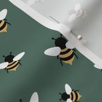 Spring bees - buzzing springtime pollinators black yellow white on dark olive green