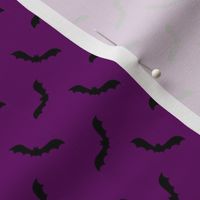 Cute bats on purple