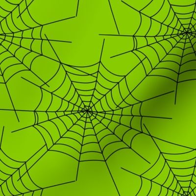 Spiderwebs on green