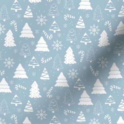 Boho christmas trees candy and snow flakes minimalist freehand vintage seventies trend white on moody blue