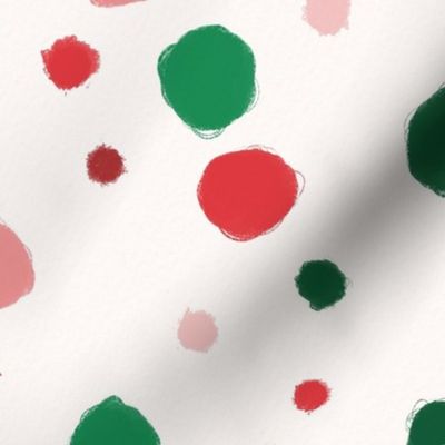 Red, pink and green watercolor dots on light beige background. Christmas terrazzo home decor.