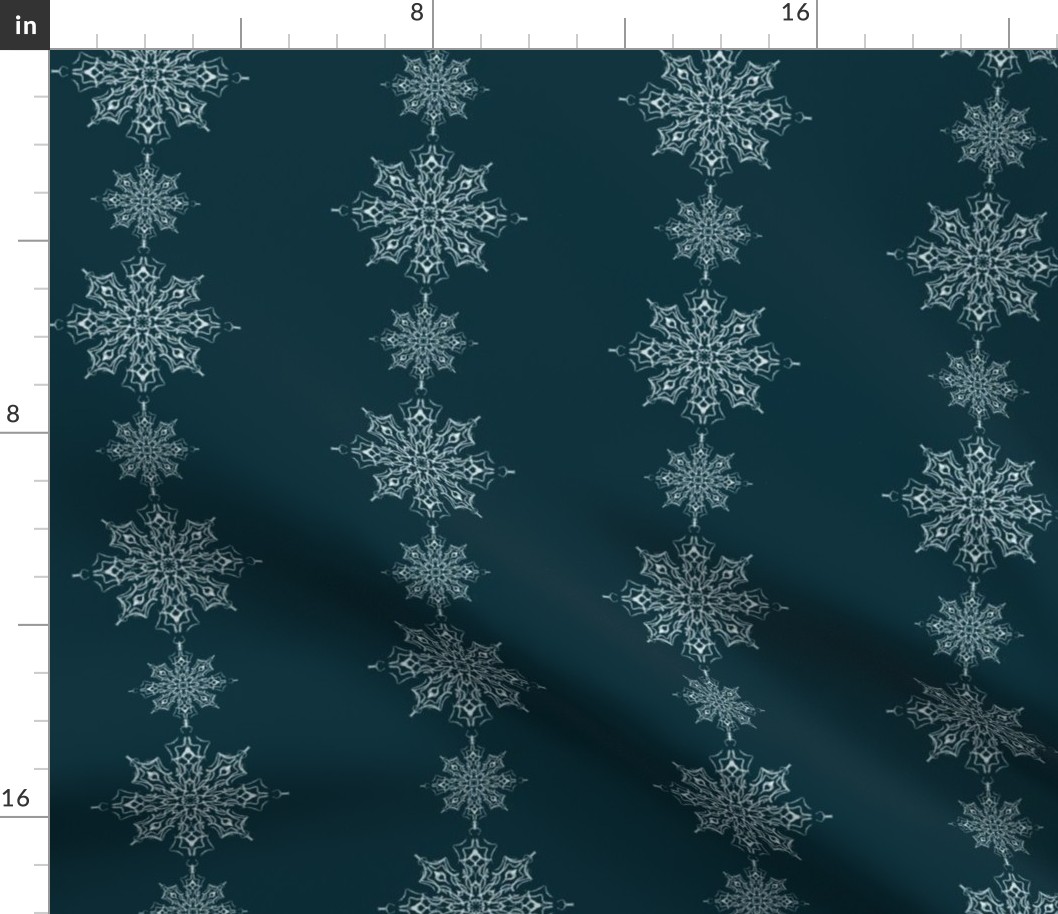 Delicate snowflakes arranged in lines on dark teal