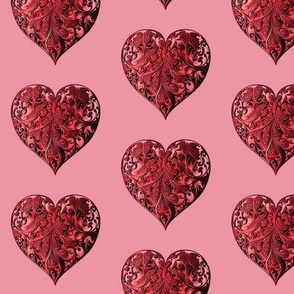 Red filigree heart on pink