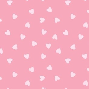 Scattered pink hearts for wallpaper