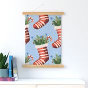 Santas Stockings in red on sky blue - large scale