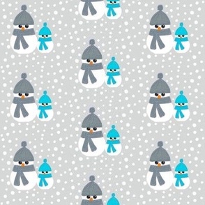 Shy snowmen with grey and turquoise hats
