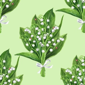 Bouquet of lilly of the valley flowers on pale green