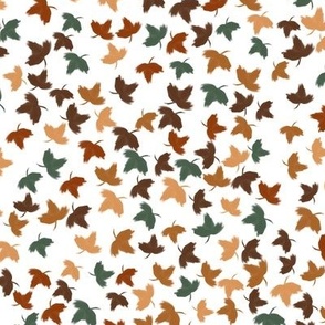 Green and brown maple leaves