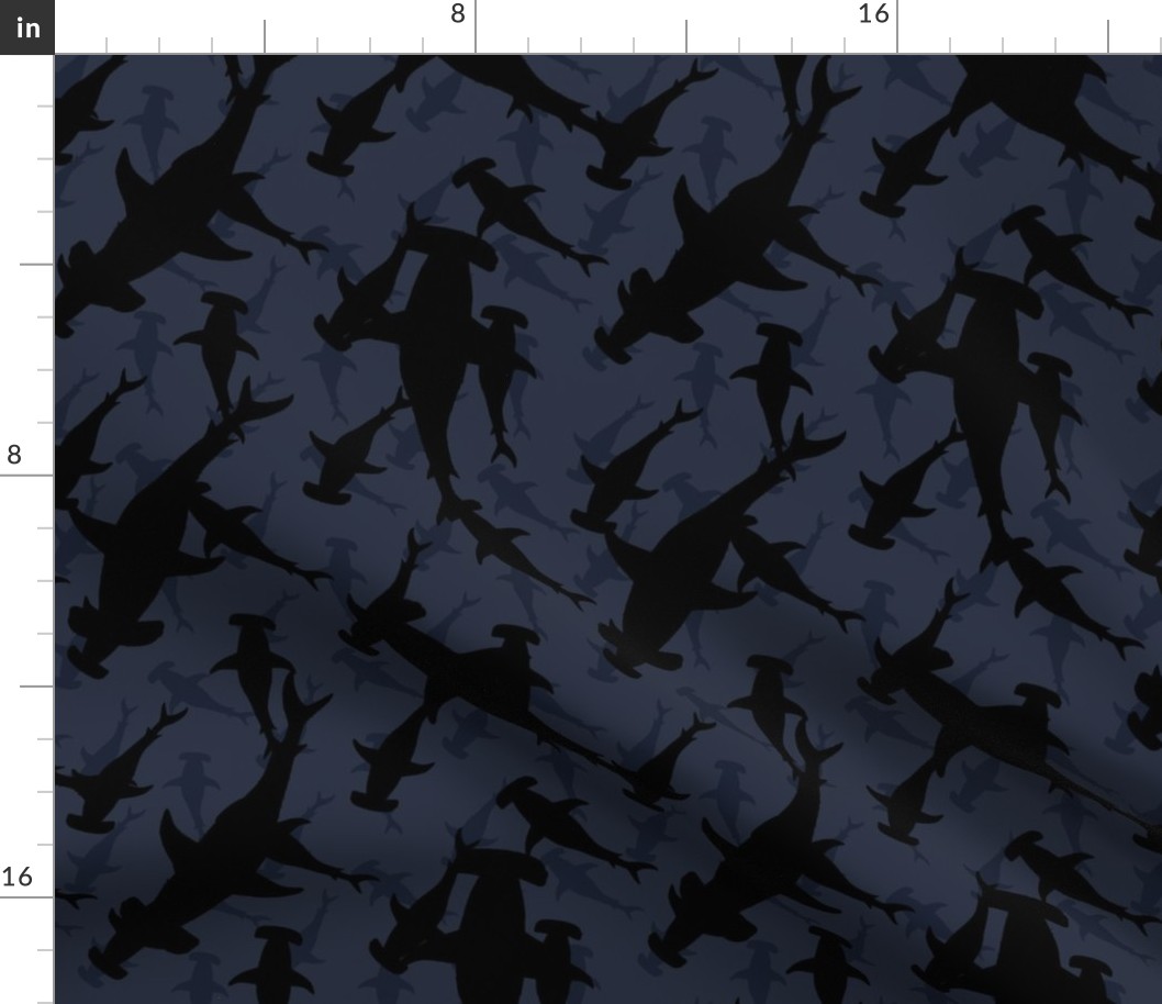 Dark Hammerhead Sharks Silhouette Circling  in Navy Blue Water