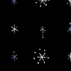 Starry snowflakes on black