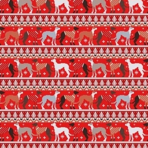 Tiny scale // Happy pawlidays fair isle greyhounds // fire brick and fire engine red background cute dogs dressed with orange and red knitted Christmas ugly sweaters