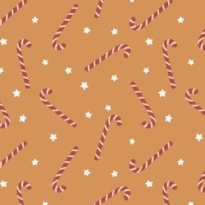 Christmas sugar canes and stars in red and cream on gold tan