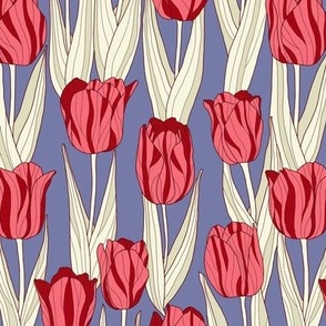Red tulips on violet blue
