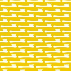 Small, Tooth Brushes on Yellow 