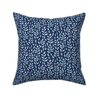 holly leaves and berries on dark cobalt blue | medium