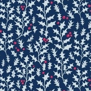 holly leaves and berries on dark cobalt blue | medium