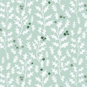 holly leaves and berries on light opal green | medium