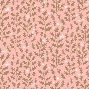 golden holly leaves and berries on light pink | micro