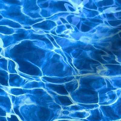 Blue Ripples in Wavy Water