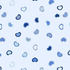 Navy to light blue ombre hearts on a pastel blue background